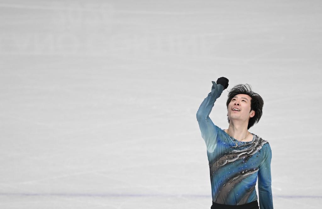 2月10日，金博洋在比赛中。当日，米兰-科尔蒂纳冬奥会花样滑冰男单短节目比赛在意大利米兰举行。新华社记者 程敏 摄
